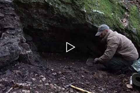 Four excavated shelter.Building underground bunker.Earth hut. primitive technology.Clay stone oven